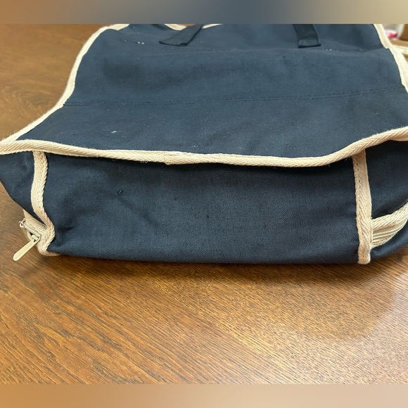 Shoe storage or carrier. Black w/tan open about 36” long. Carries 6 pair easily - Picture 2 of 4